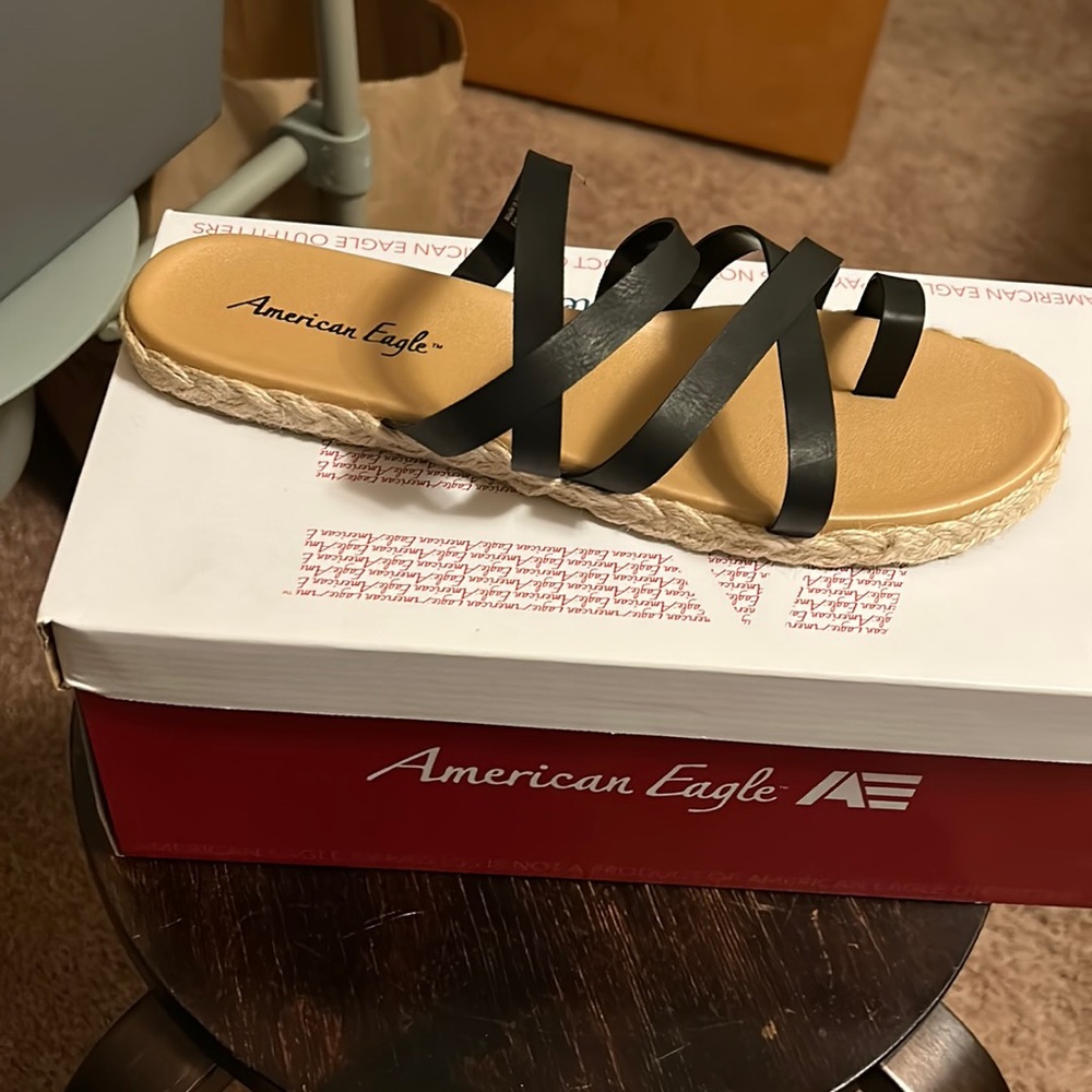 Black leather sandals 10.